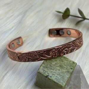 Magnetic copper tone cuff bracelet